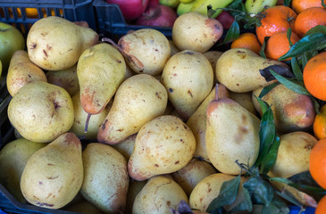 Fresh yellow pears for sale at Porto market (Mercado do Bolhao). Portugal