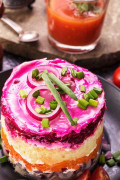 Herring under a fur coat closeup above. Russian national cuisine