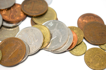 A photo of a large number of coins of different states.