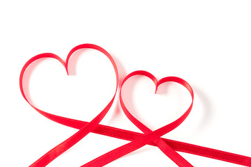 Two hearts made of ribbon on white background. Valentines day.