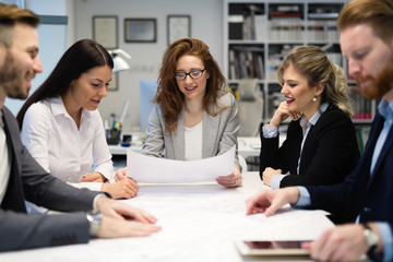 Group of architects working together on project