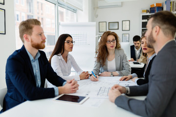 Group of architects working together on project