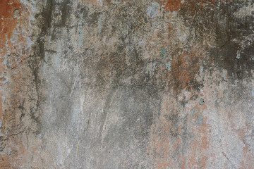 Wall fragment with scratches and cracks