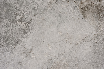 Wall fragment with scratches and cracks