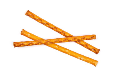 Salty cracker pretzel sticks isolated on white background, top view