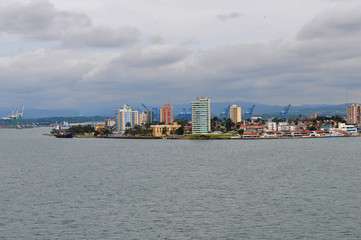 Fototapeta premium landscape of river bank with private houses and small berths for yachts and boats