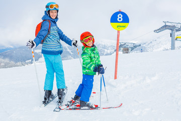 Skiers in a winter ski resort.