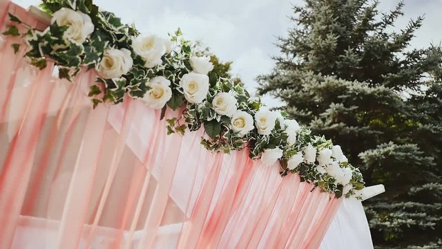 Wedding decoration of the arch. Wedding arch decorated with flowers.