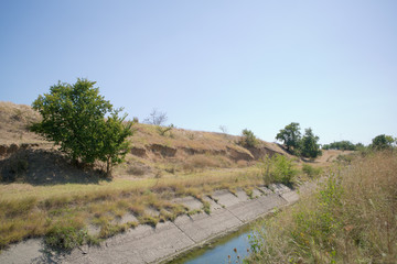 irrigation canal. Old irrigation canal made of concrete slabs