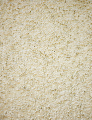 beige rough plaster detail, copy space for typing