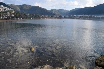 Beautiful sea landscape with rainbow village, Icmeler, surrounds the resort town of Marmaris
