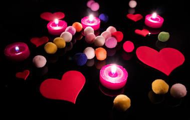 Hearts colored balls and candles