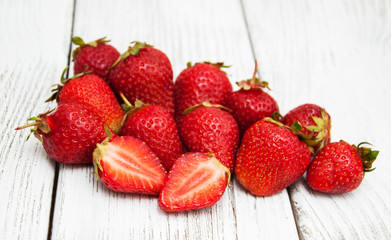 ripe strawberries on wooden table