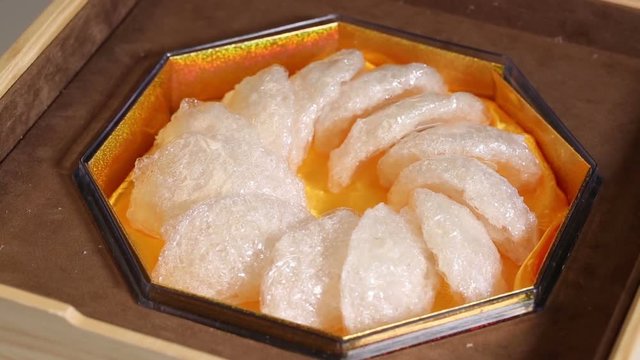 Edible bird's nest placed in a box. Closeup. Asian food, Hd video.