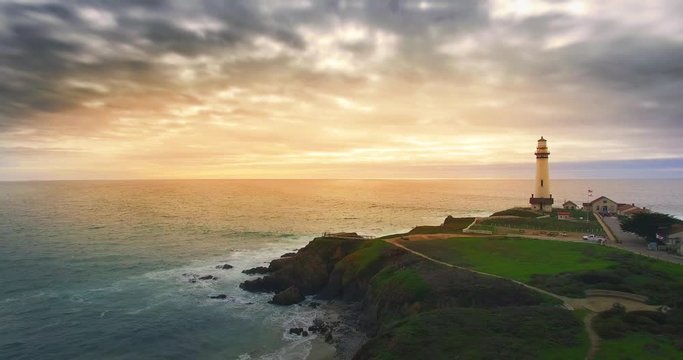 Aerial view of Pigeon Point Lighthouse and Pacific Ocean at sunset. California