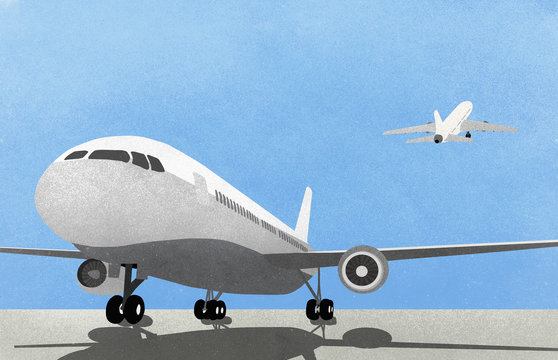 Airplane on runway against blue sky