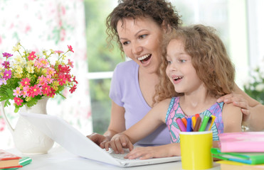 portrait of happy  mother and daughter 