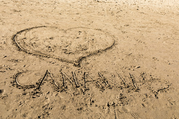 Drawings in the sand at Puerto Rico Beach in Gran Canaria, Spain.