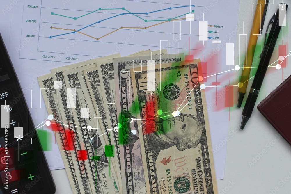 Wall mural double exposure of business calculator and pen and dollar money with stock market or financial graph