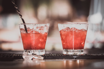 Handcrafted cocktail with grinded strawberry berryes and ice