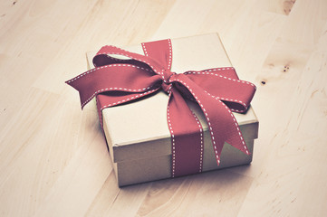 Gift box with red ribbon