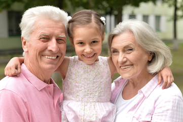 Grandparents with her granddaughter
