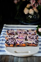 Curd cake with blueberries, decorated with flowers