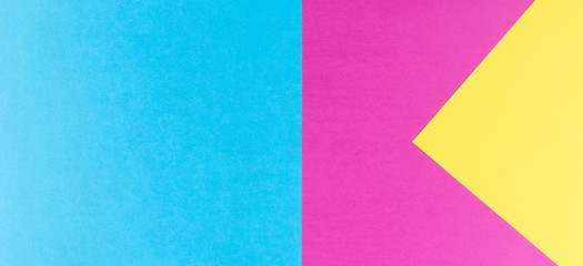 Abstract geometric paper background. Yellow, blue and purple colors.