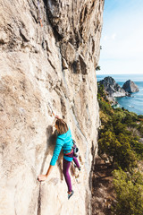 A rock climber on a wall.