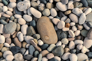Beach stones background. Top view.