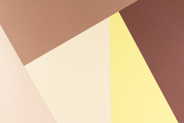 Colorful soft brown, beige and yellow paper background.