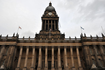Naklejka premium front view of the historic leeds town hall in west yorkshire with entrance and clock tower