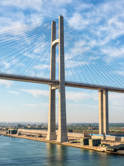 The Mubarak Peace Bridge, also known as the Al Salam Bridge, or Al Salam Peace Bridge, is a road bridge crossing the Suez Canal at El-Qantara
