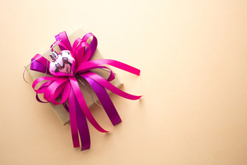 gift box with pink ribbon bow in christmas concept