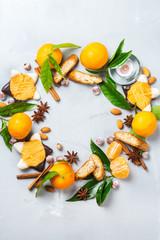 Christmas cookies wreath with spices and tangerine