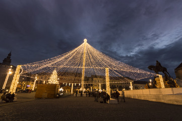 night scenery city square with Christmas tree. Cluj Napoca
