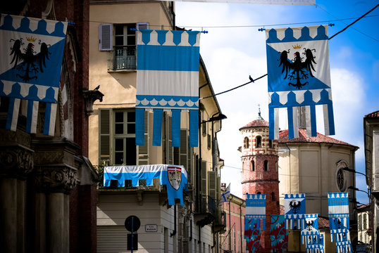 Colorful Flags Decorated Medieval Buildings Before The Palio Horse Race