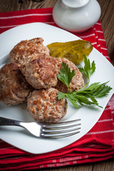 Meatball with parsley.