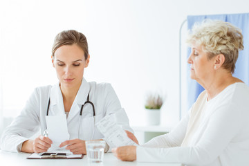 General doctor consulting with patient