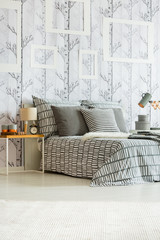 Patterned grey and white bedclothes