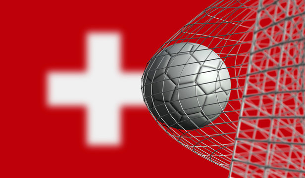 Soccer ball scores a goal in a net against Switzerland flag. 3D Rendering