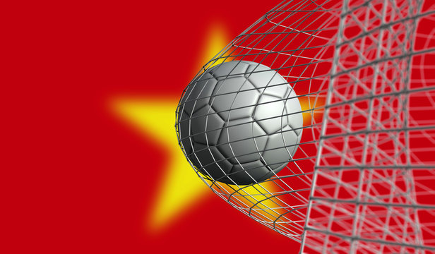 Soccer ball scores a goal in a net against Vietnam flag. 3D Rendering