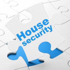 Safety concept: House Security on puzzle background