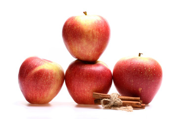 Perfect food mix concept. Apples and cinnamon isolated on white