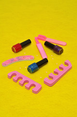 A collection of accessories needed for a manicure or pedigree isolated on plain background