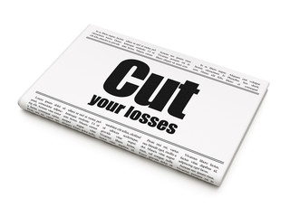 Finance concept: newspaper headline Cut Your losses