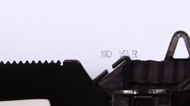 Word is no war , printed on a piece of paper. Close up