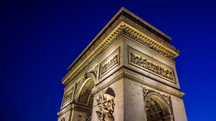 Fototapeta na wymiar Arc de Triomphe at twilight in Paris, France