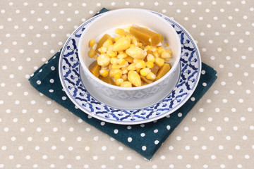 Delicious streamed sweet corn ,pumpkin and ,ginkgo in coconut milk .