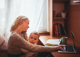 Freelance worked mom with baby